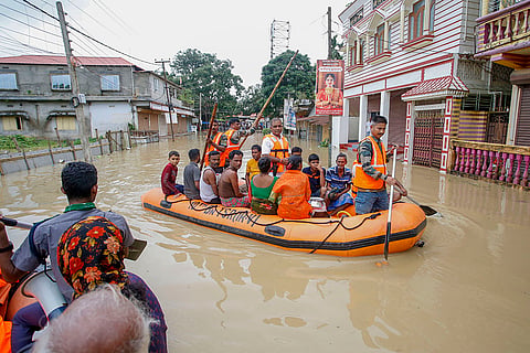 Flood in Tripura: NDRF personnel evacuate people from a flood-affected area